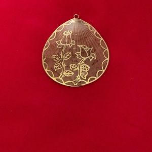 Seashell pendant with gold overlay